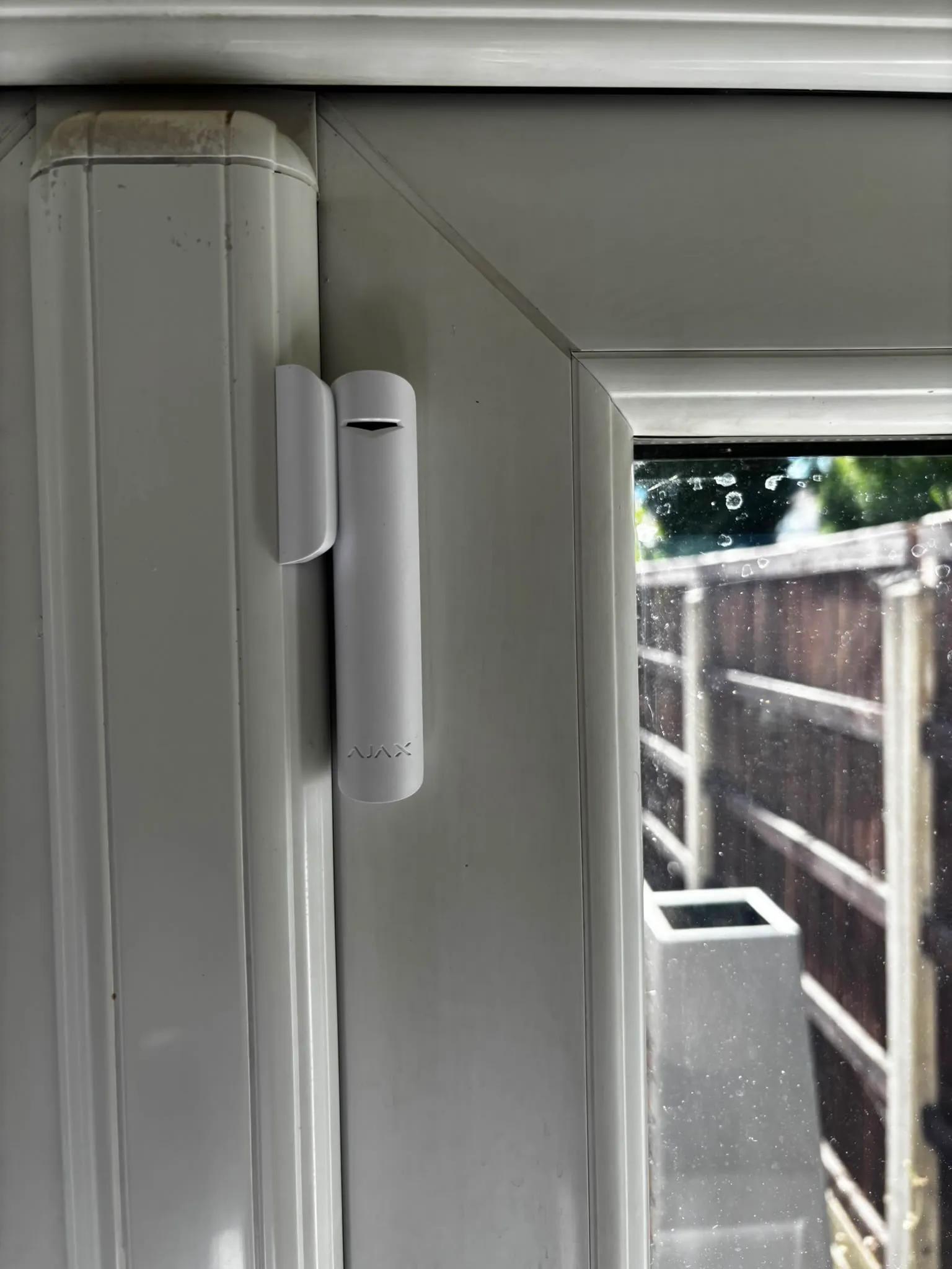 Ajax door contact on a side entrance door overlooking the rear garden.