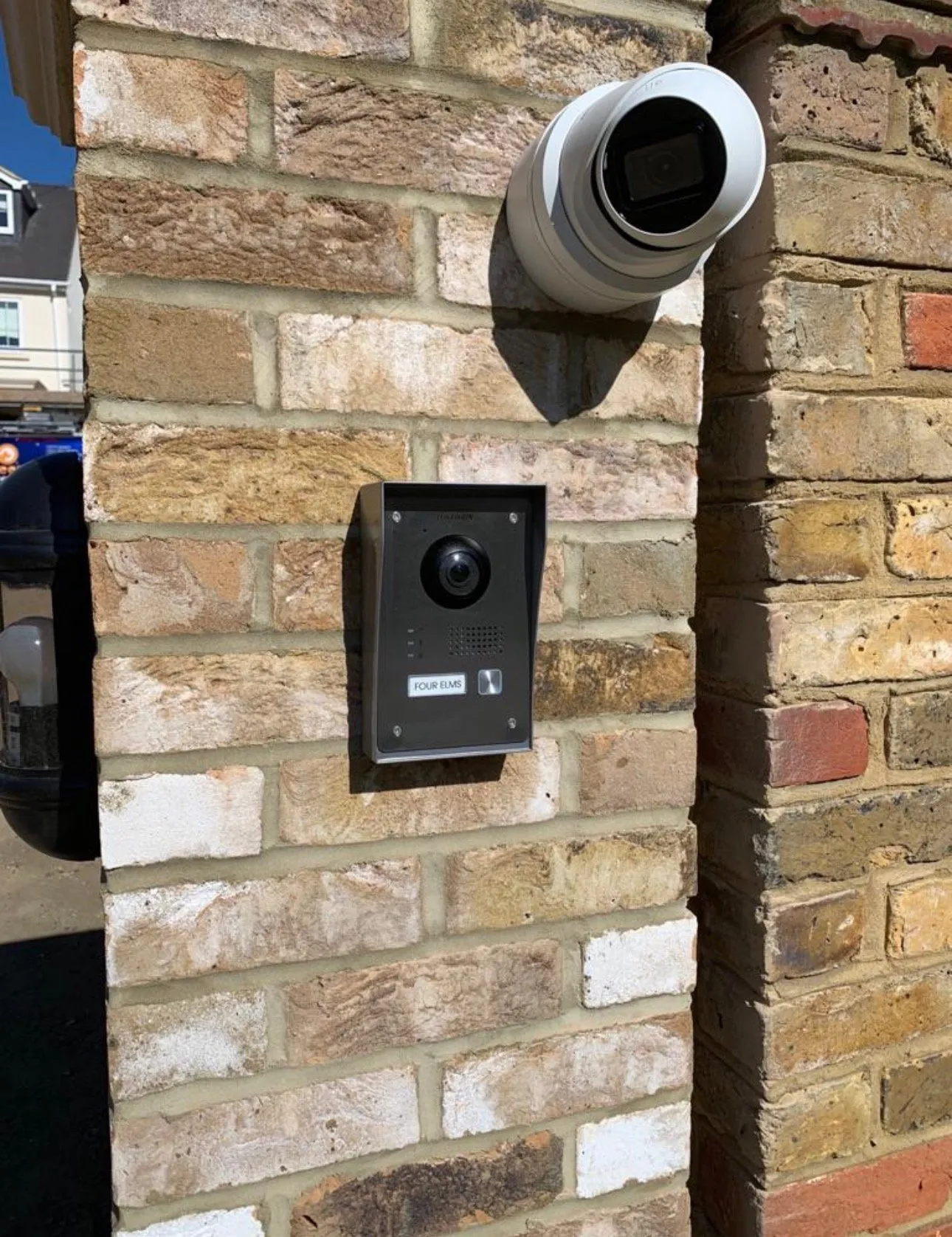 Video door entry unit with integrated CCTV camera covering the property entrance.